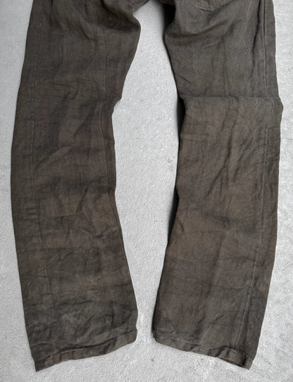 Brown pants on a light gray background