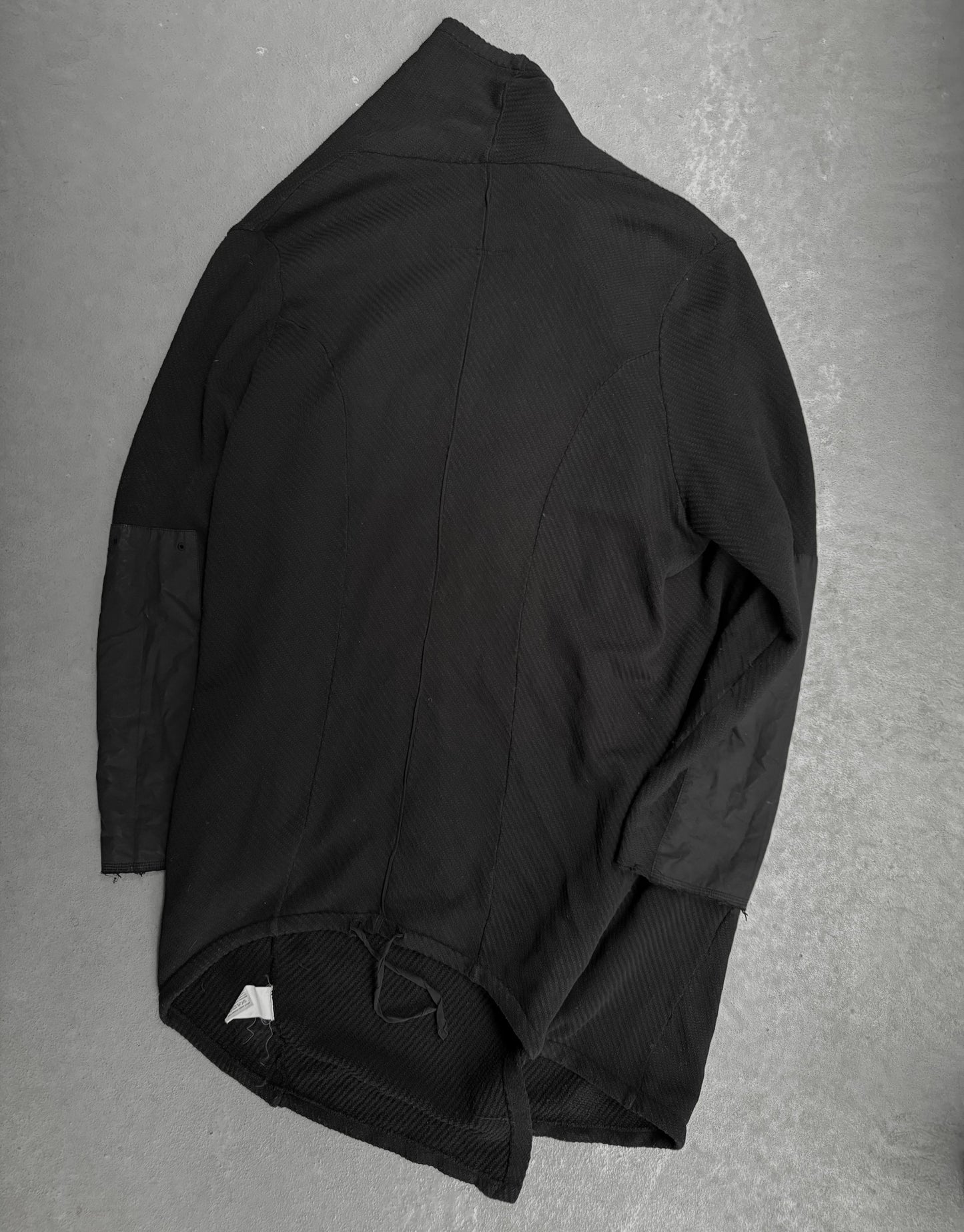 Black jacket on a gray textured background