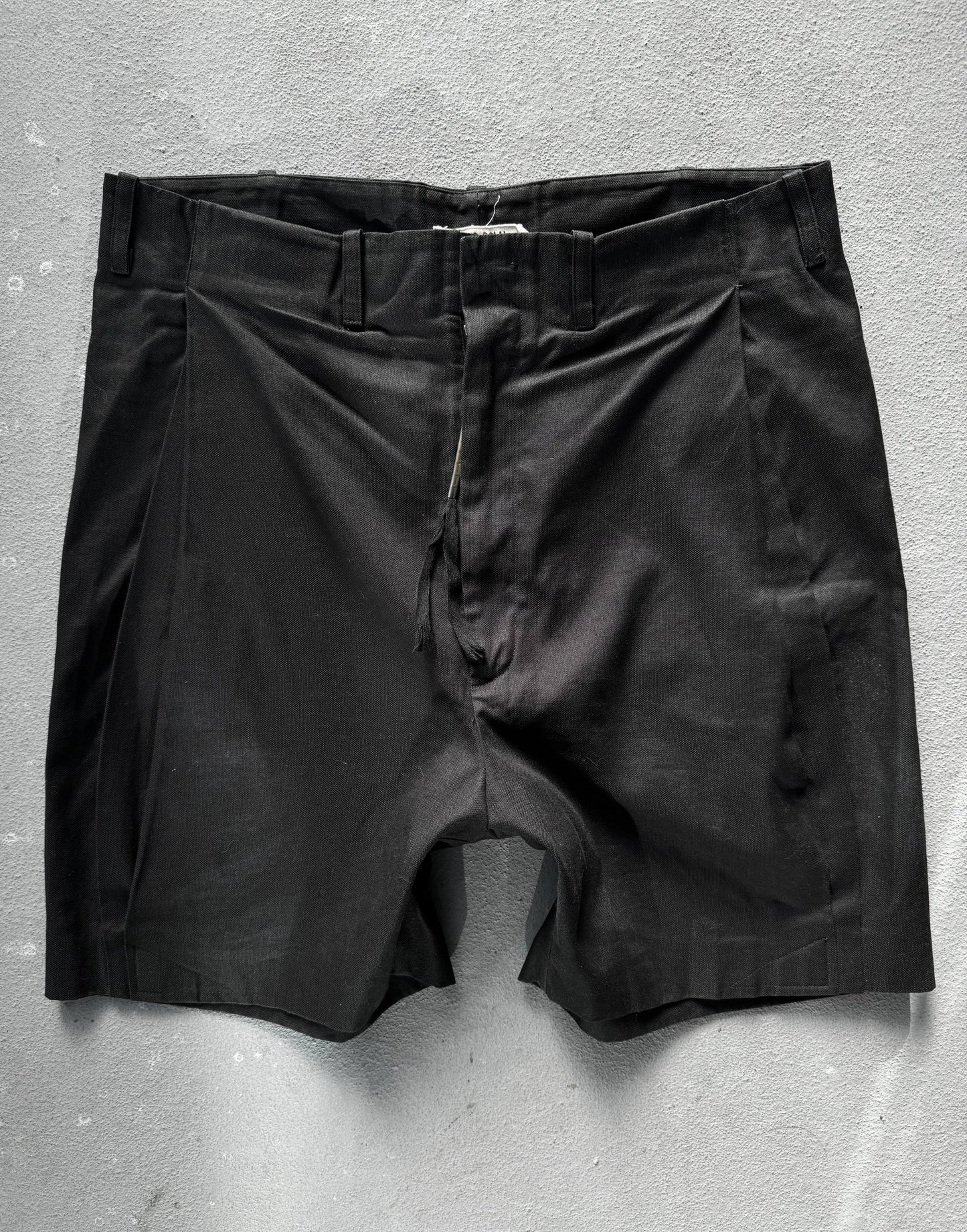 Black shorts on a gray background