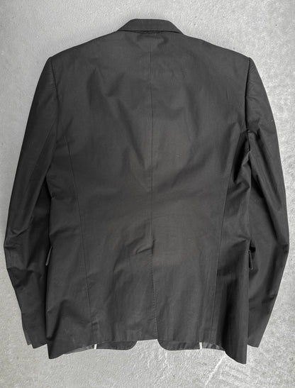 Black jacket on a gray textured background
