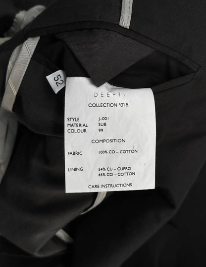 Clothing label with details on a black garment