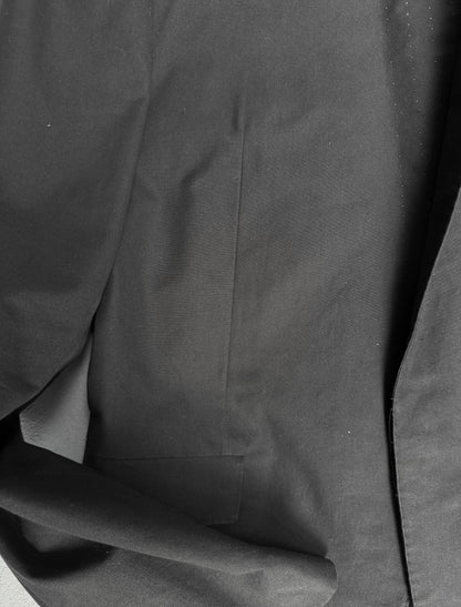Close-up of dark gray fabric with folds