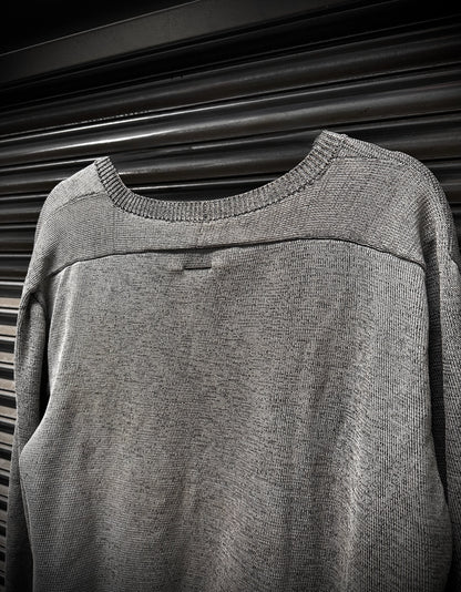 Gray sweater on a black background