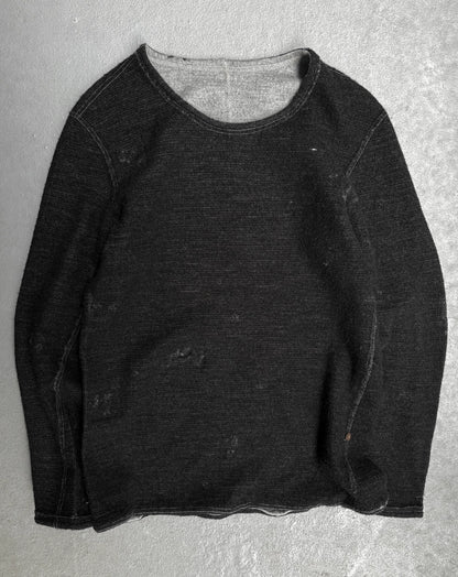 Dark gray long-sleeve shirt on a light gray background