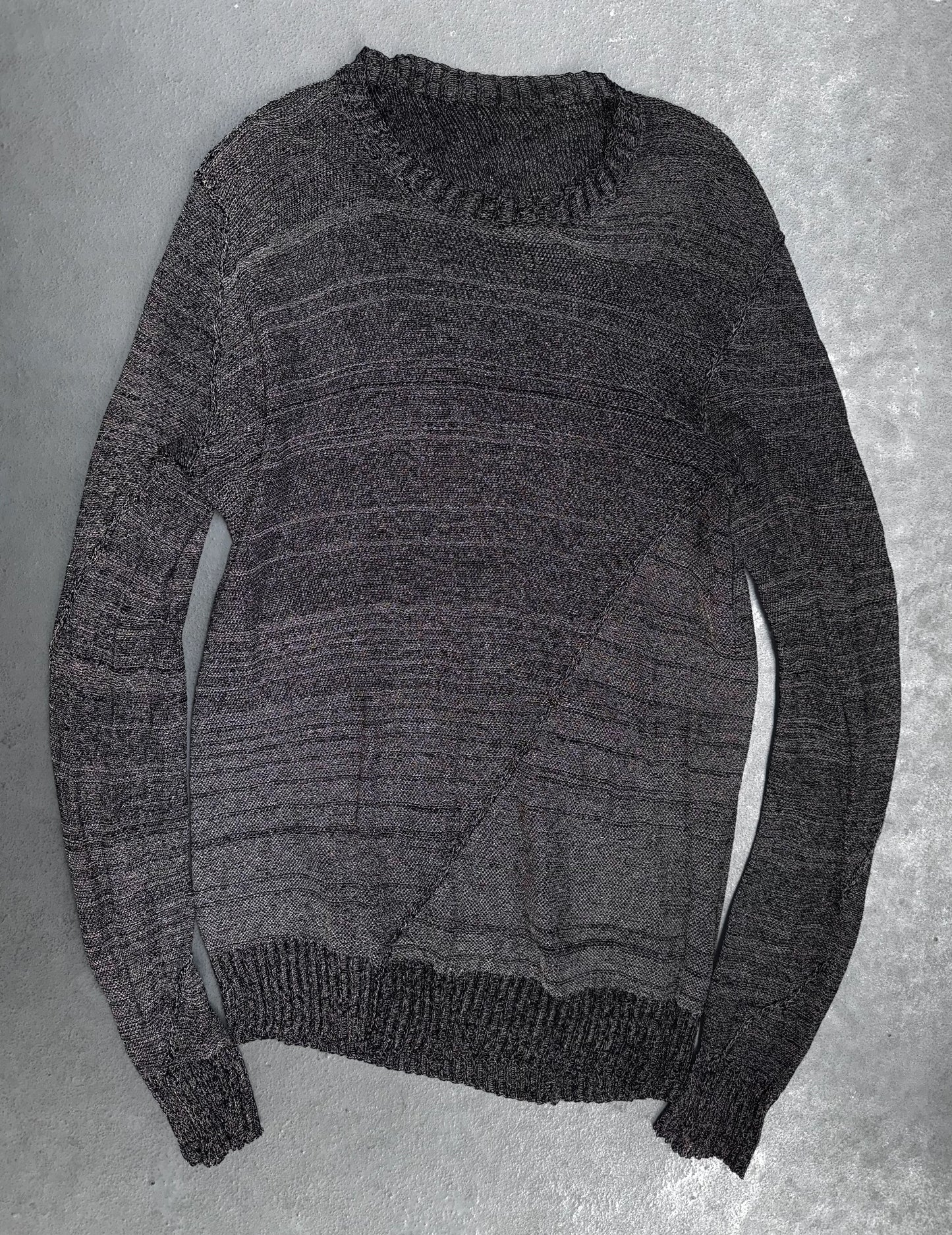 Gray sweater on a gray background