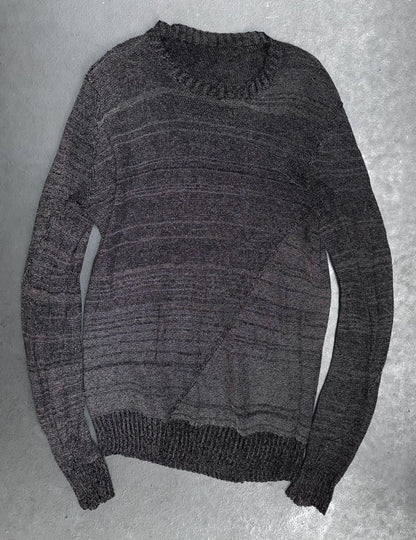 Gray sweater on a gray background