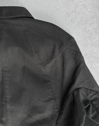 Black jacket on a textured gray background