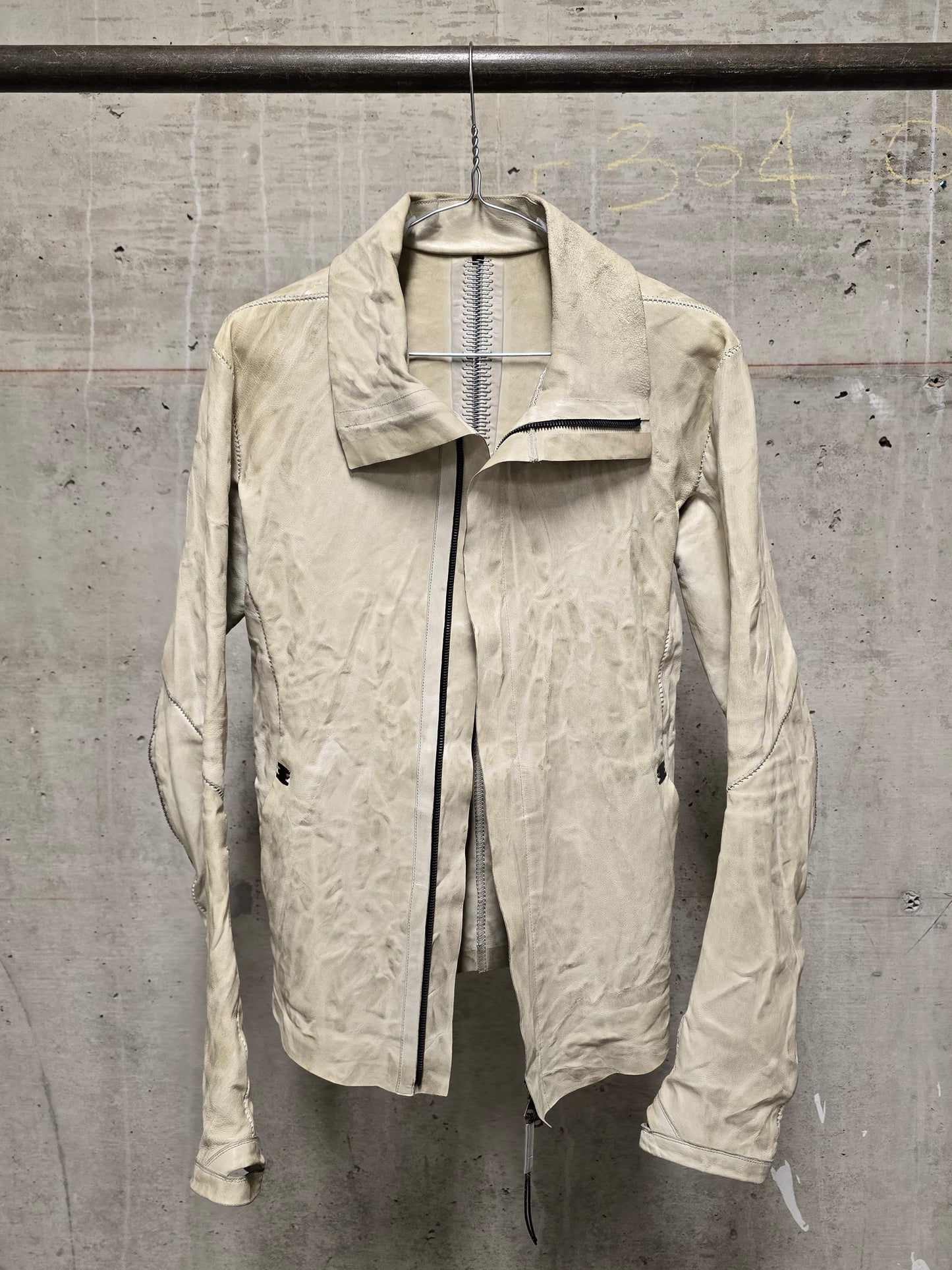 Isaac Sellam: “Experience” Pale Yellow Overlock High Neck Metal Spine Lambskin Leather Jacket