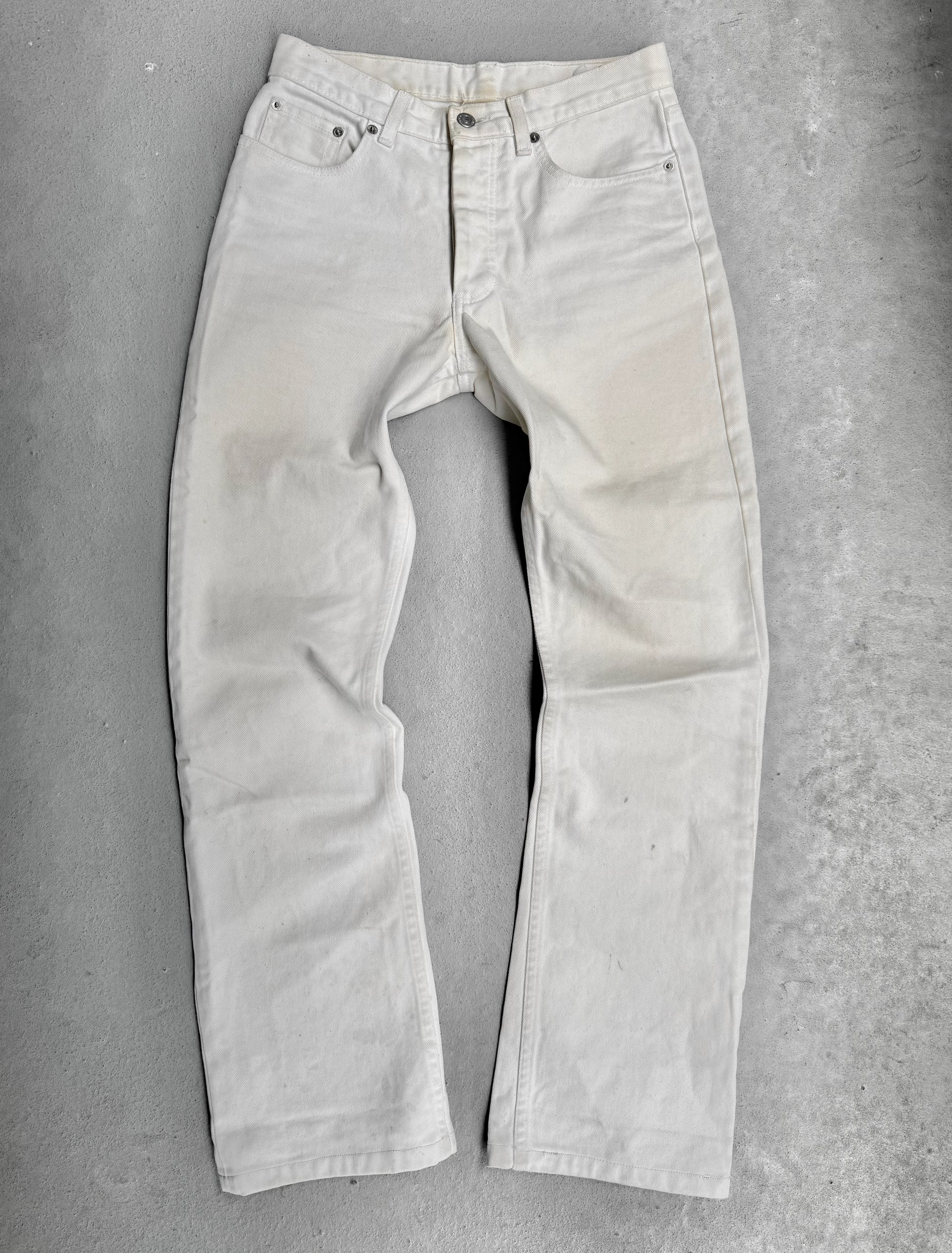 Light-colored jeans on a gray background