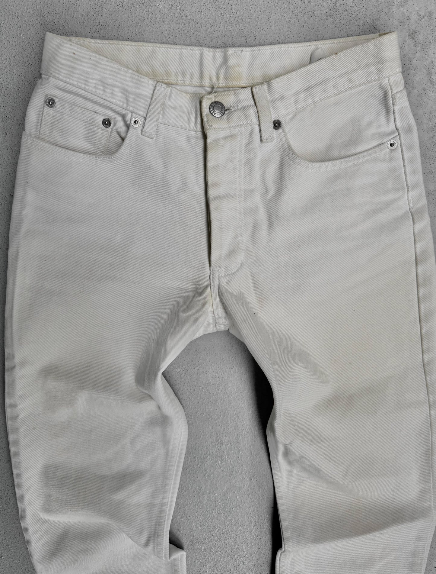 Light gray pants on a gray background