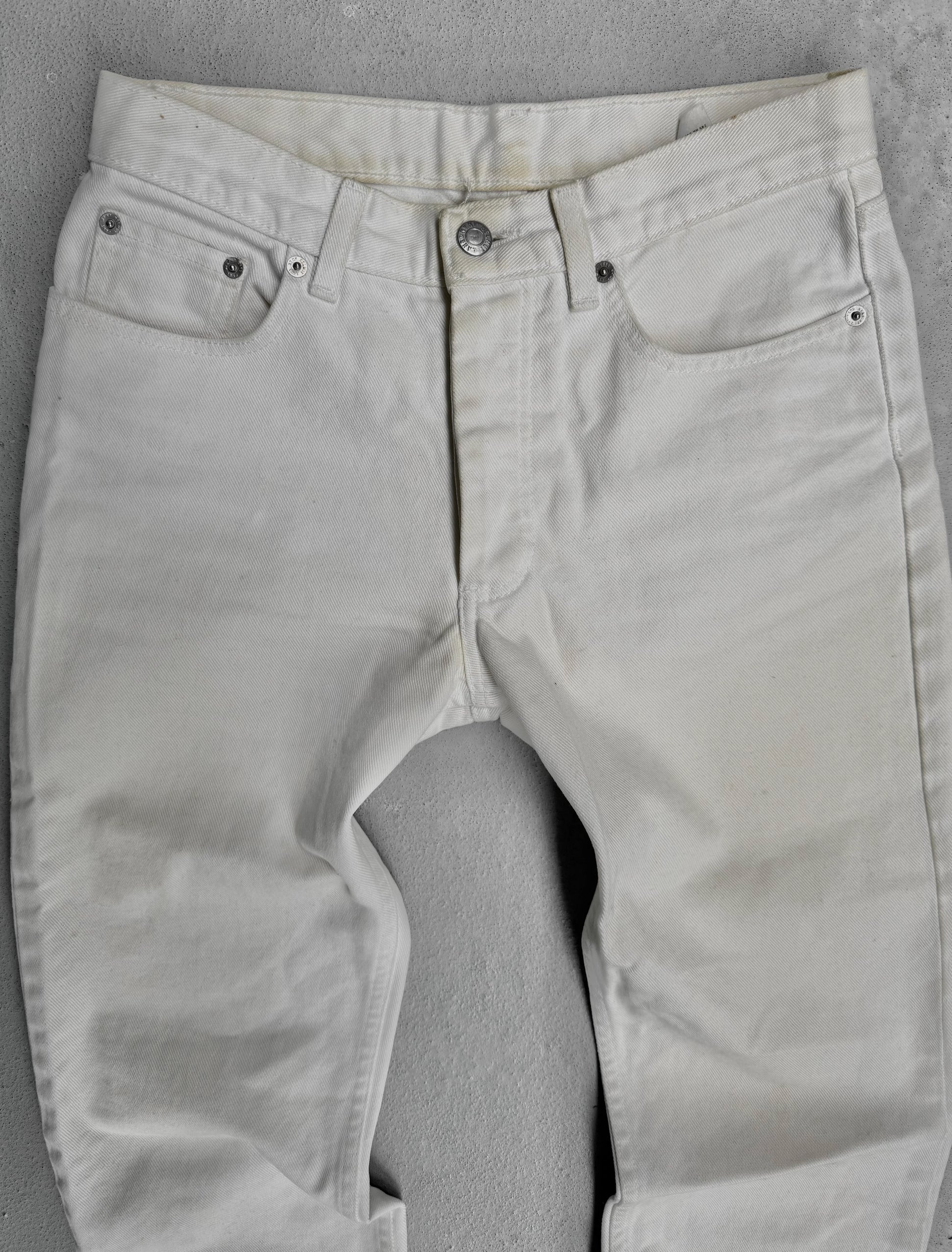 Light gray pants on a gray background