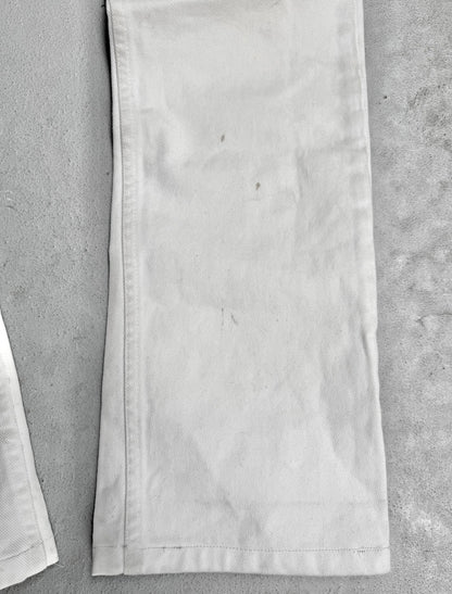 Close-up of a white fabric strip on a gray surface