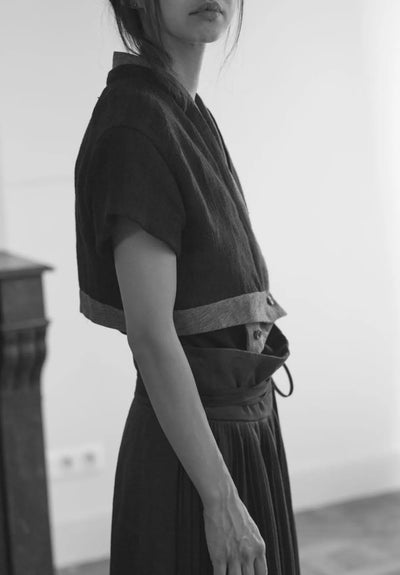 Individual Sentiments lookbook outfit — layered minimalist tailoring in subdued monochrome palette