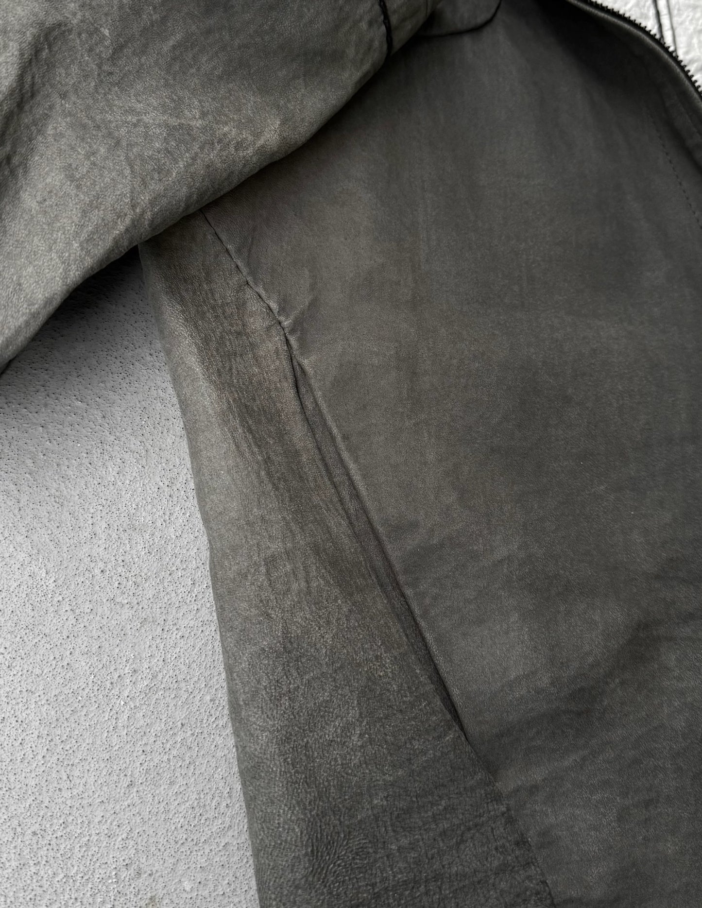 Close-up of a textured gray fabric surface