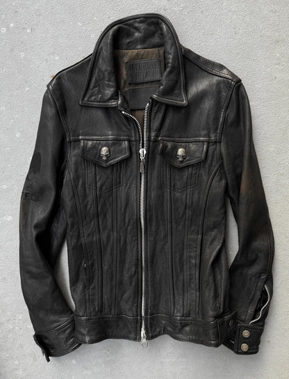 Black leather jacket on a gray background