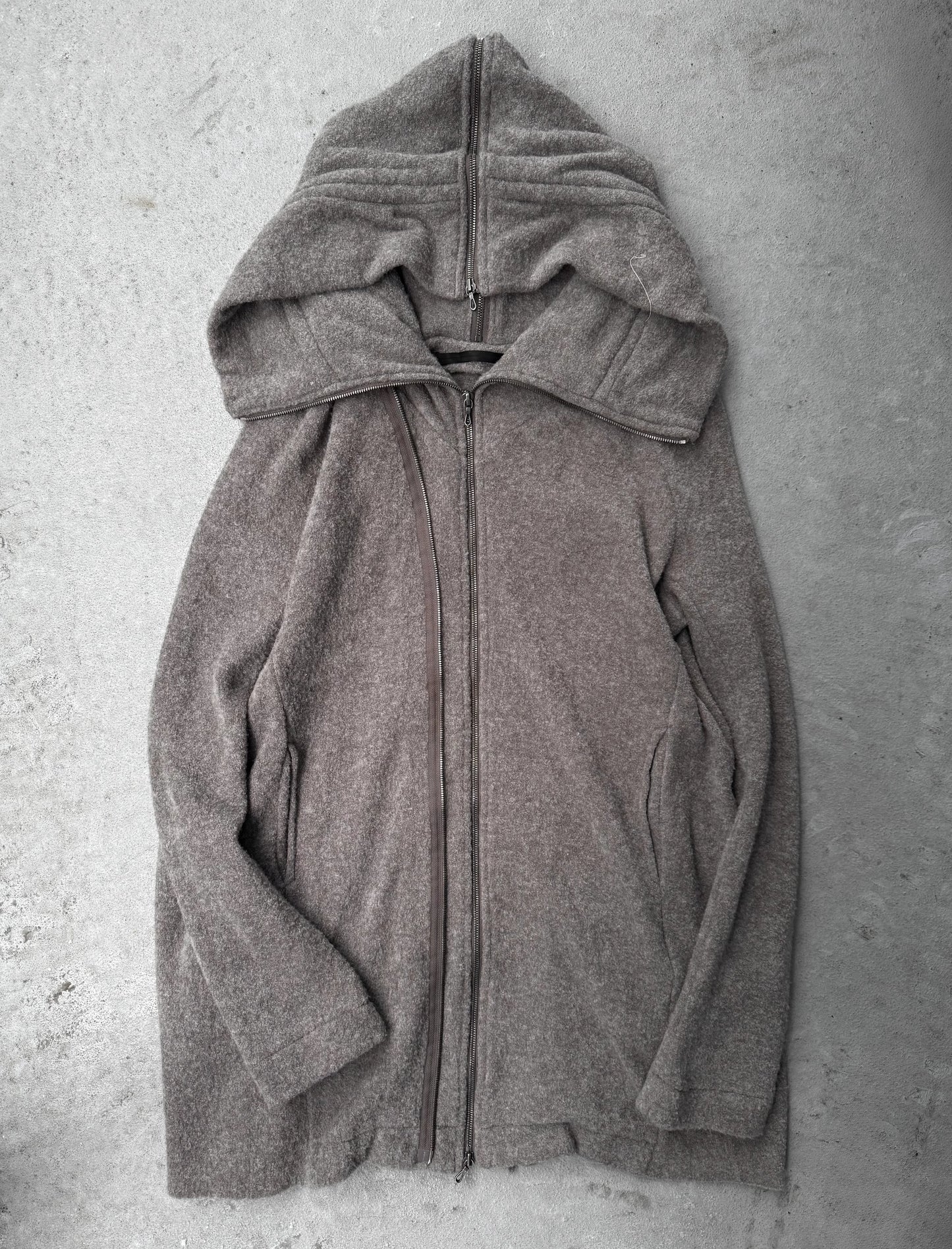 Gray hoodie on a textured gray background