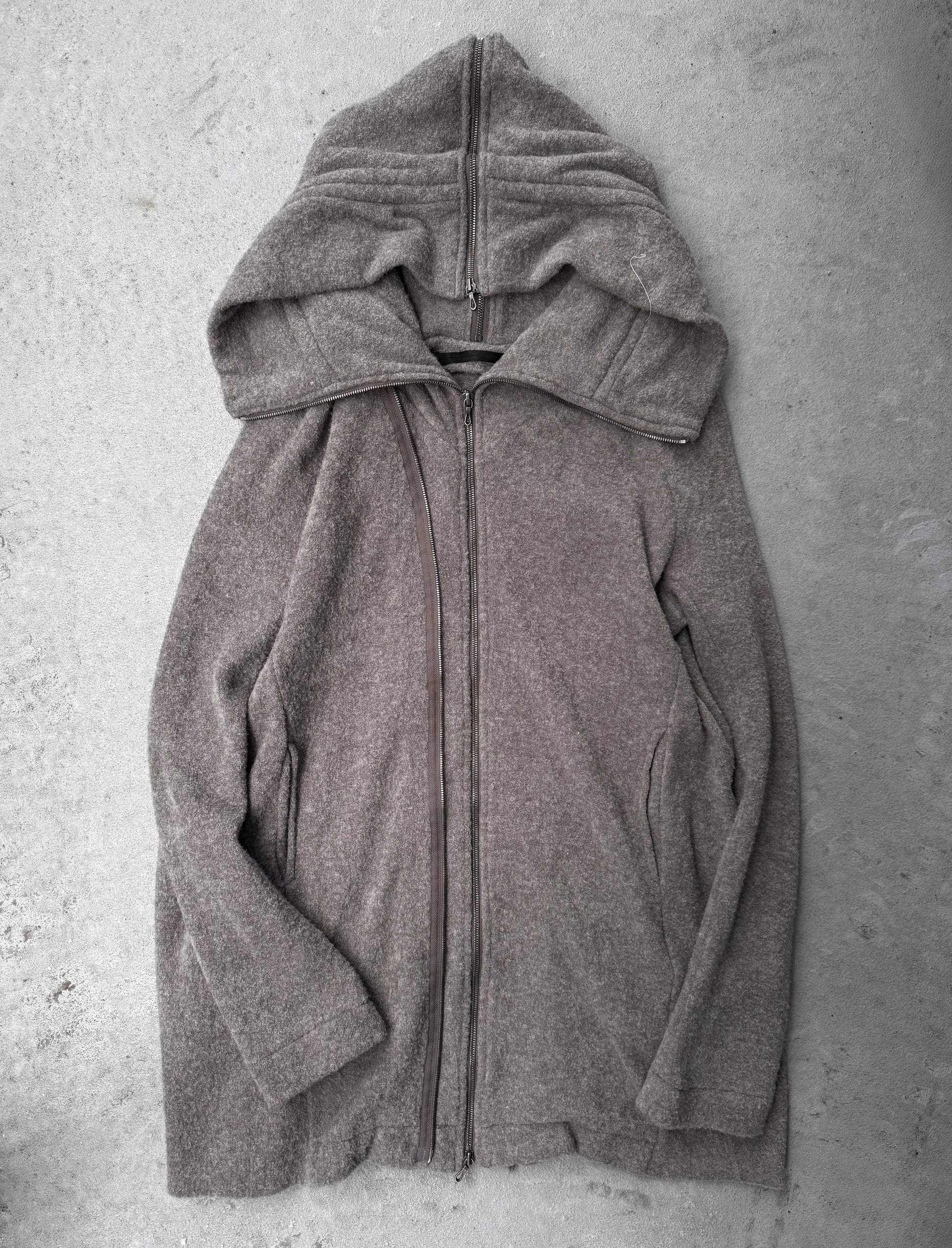 Gray hoodie on a textured gray background