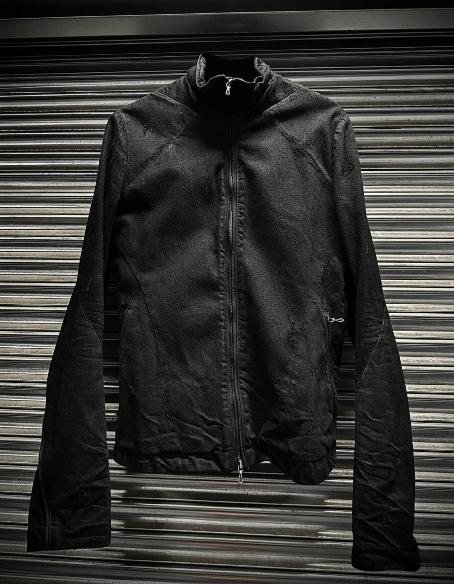 Black jacket on a metallic surface