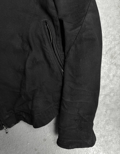 Black jacket on a gray surface