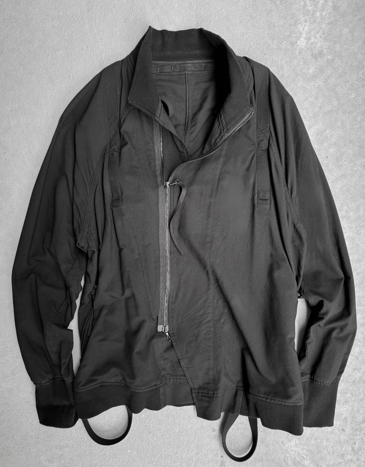 Julius_7 SS18 '"APCLPS;” Asymmetric Raglan Military Strap Track Jacket