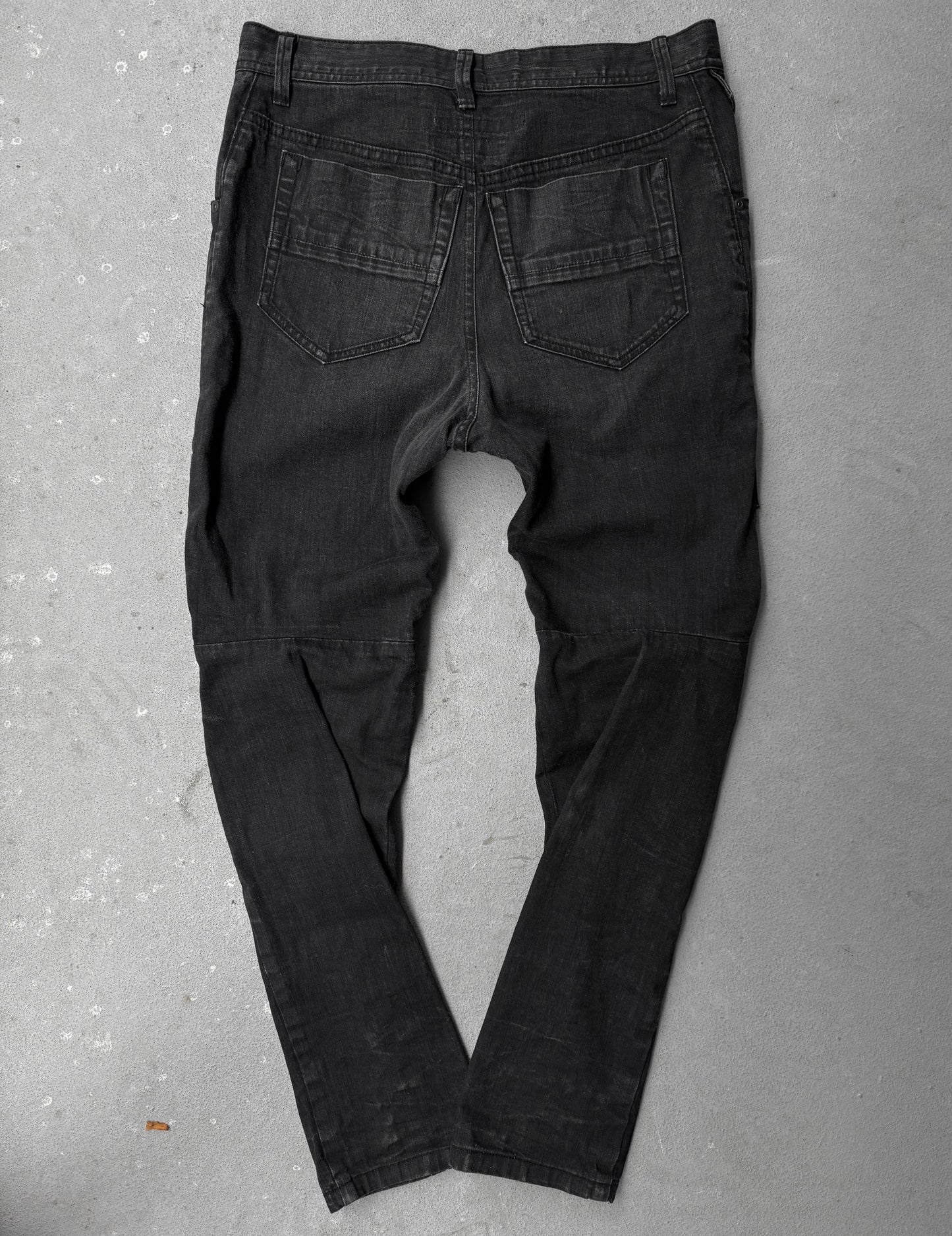Julius_7 SS22 "_PERMANENT" Washed Black Distressed J-Cut Denim