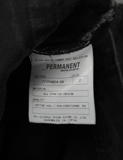 Julius_7 SS22 "_PERMANENT" Washed Black Distressed J-Cut Denim
