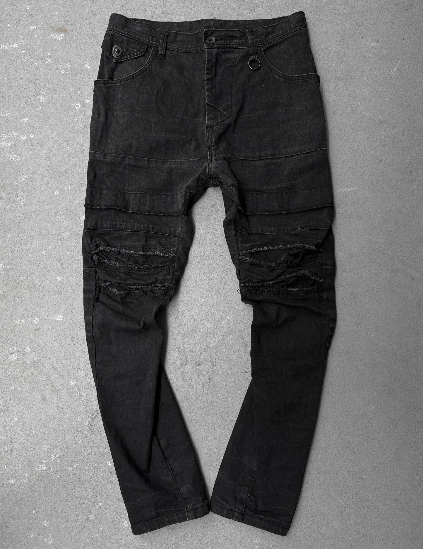 Julius_7 SS22 "_PERMANENT" Washed Black Distressed J-Cut Denim