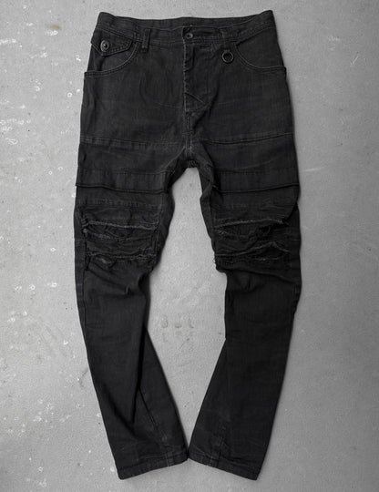 Julius_7 SS22 "_PERMANENT" Washed Black Distressed J-Cut Denim