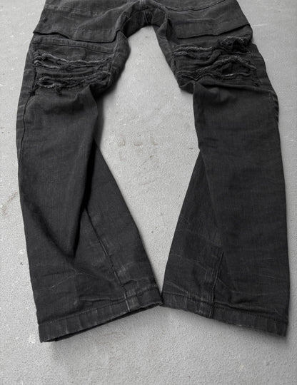 Julius_7 SS22 "_PERMANENT" Washed Black Distressed J-Cut Denim