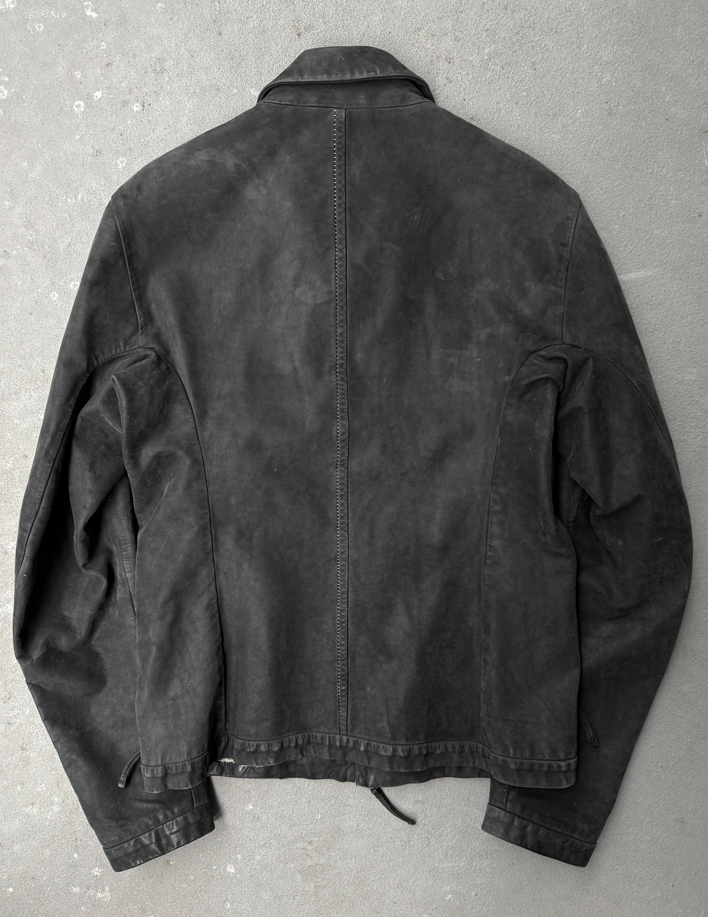 Black jacket on a textured gray background