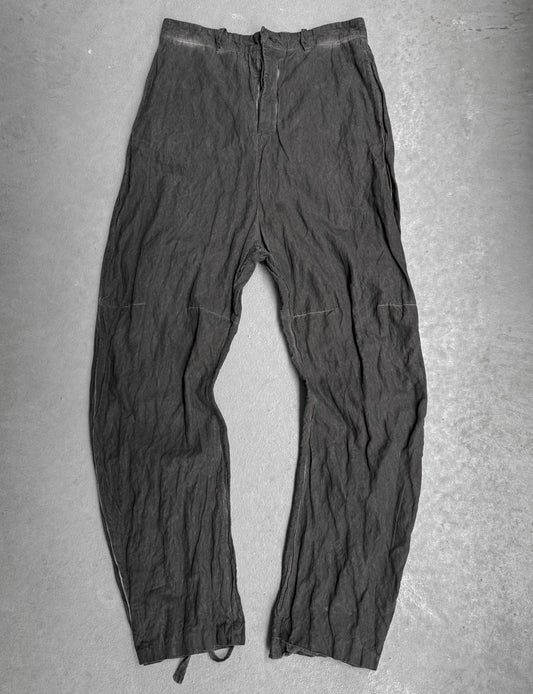 Dark gray pants on a gray background