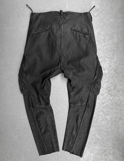 Black pants on a gray textured background