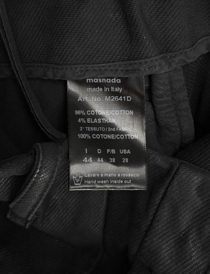 Clothing label on a dark fabric background