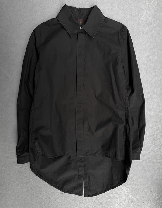 Black shirt on a textured gray background