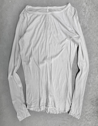 White long-sleeve shirt on a gray background