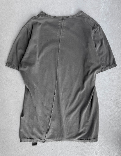 Gray shirt on a textured gray surface