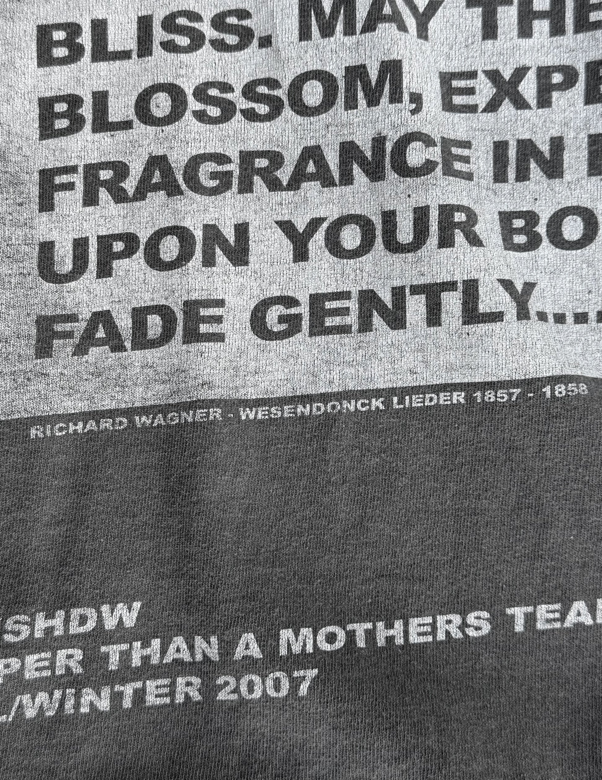 Text on a gray background with a quote and branding information.