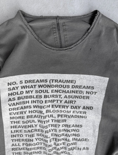 Gray sweatshirt with printed text on a textured surface