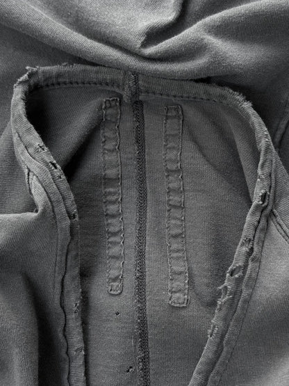 Close-up of a textured fabric surface with stitching details