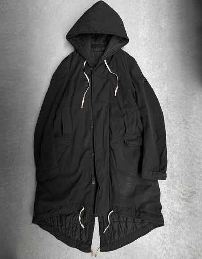 Black hooded coat on a gray background