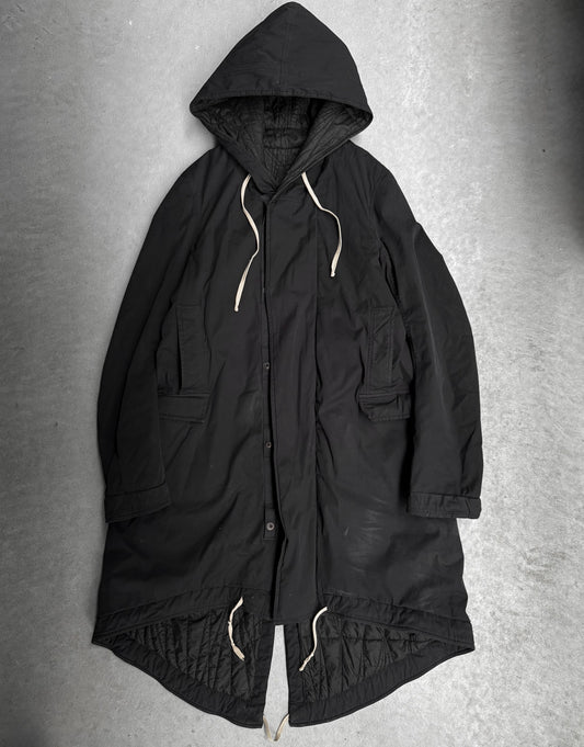 Black hooded coat on a gray background