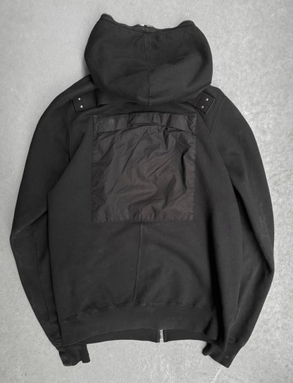 Black jacket with a hood on a gray background