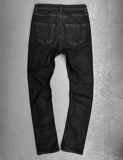 Black jeans on a gray background