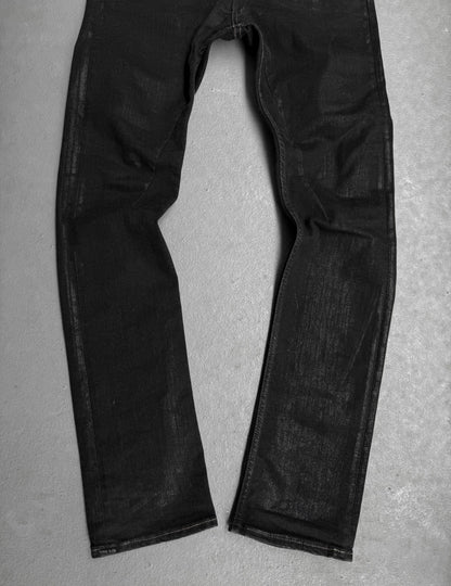 Black jeans on a gray background