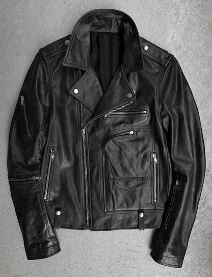Black leather jacket on a gray background