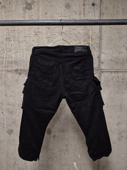 Julius_7 SS11 “Chaos ; Ontological Anarchism” Black 8oz Cotton Denim Distressed Gas-Mask Cargo Capris