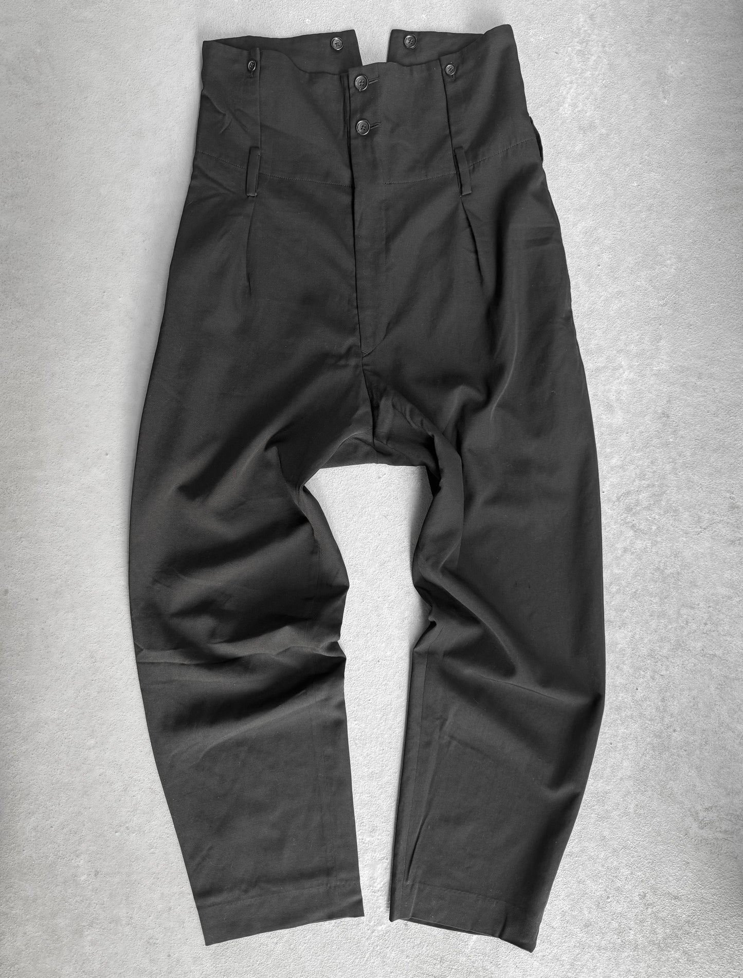 Black pants on a gray background