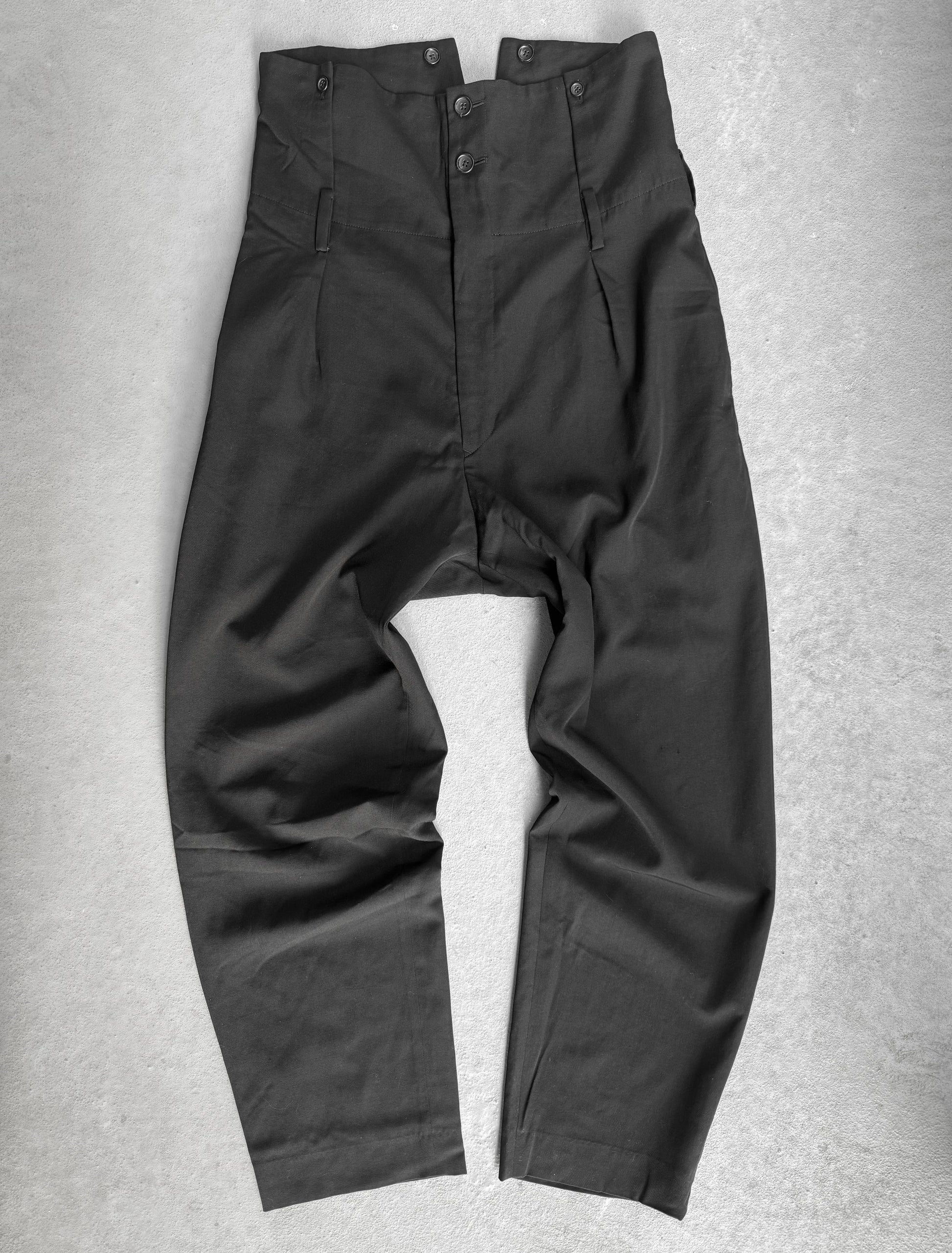 Black pants on a gray background