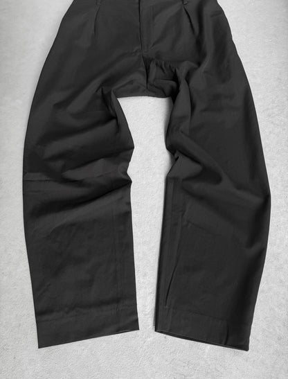 Black pants on a light gray background