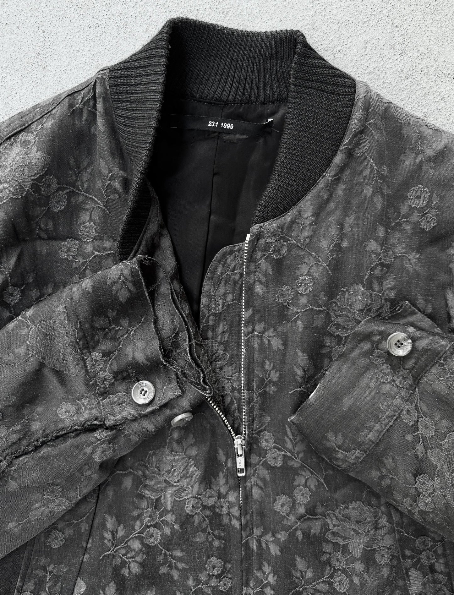 Floral patterned jacket with a textured background